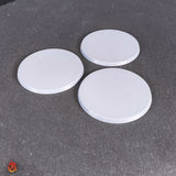 10 bases en blanco de 28,5 mm